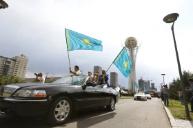 Олимпиада чемпиондары мен жүлдегерлері Астана көшелерімен жүріп өтті - фото 1